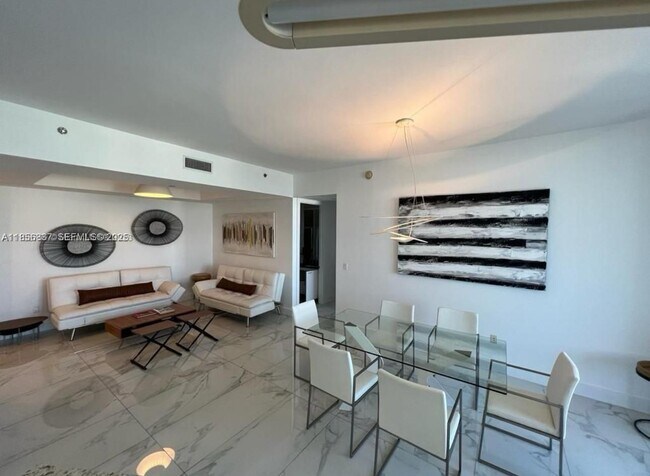 Building Photo - 15811 Collins Ave