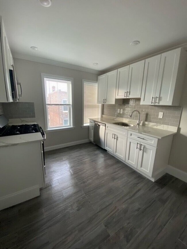 Primary Photo - Renovated 4 bedroom unit with easy access!