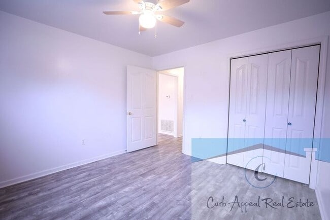 Building Photo - First month move in special $900!! Beautiful 3-bed, 2 bath condo with 2-car garage - includes was...