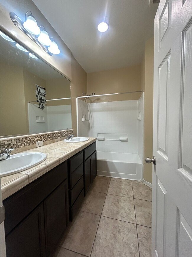 Building Photo - Step into your new residence, a charming s...