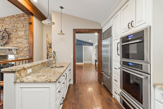 Building Photo - Stunning 5-Bed, 4.5-Bath Custom Home on Du...