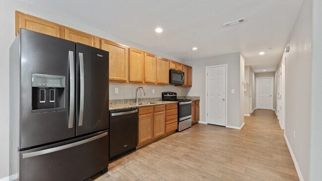 Building Photo - "Spacious 3-Bedroom Duplex in Prime Spring...