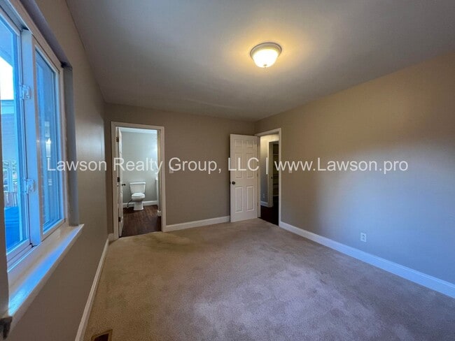 Building Photo - Charming Brick Ranch with Beautifully Land...