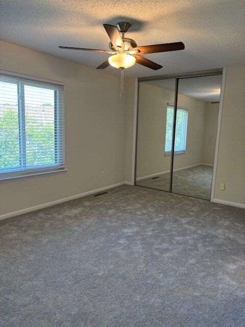 Upstairs back bedroom with private attached bathroom. New carpet and paint. - 3913 Whooping Crane Cir