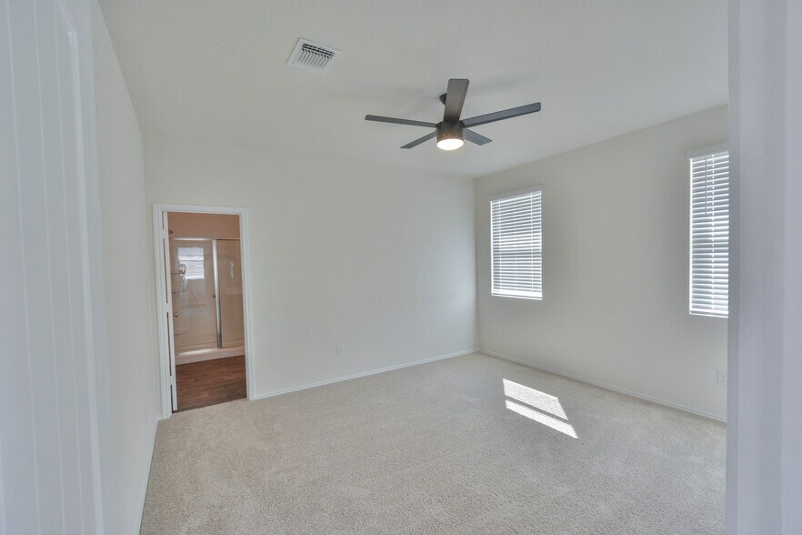 Master bedroom with master bathroom en suite - 3702 Chappie Lane