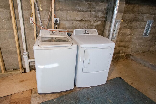 Building Photo - Fenced Yard, 2-Car Garage + Internet Included