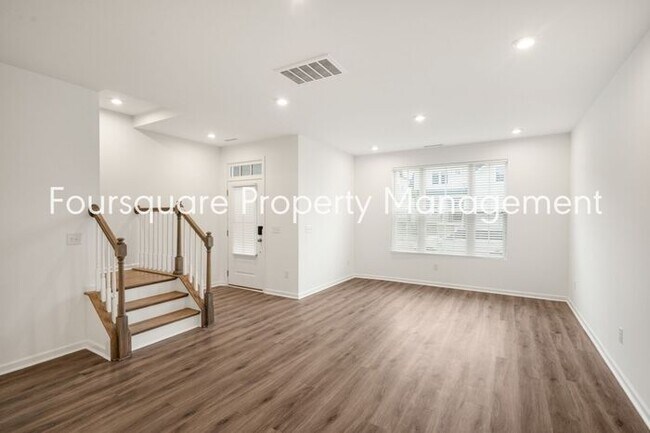 Building Photo - Spacious 3-Bed / 2.5-Bath Townhome with First-Floor Den, Hardwood Floors & 1-Car Garage – Wendell...
