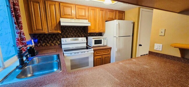 Building Photo - 2915 Pine Cone Cir