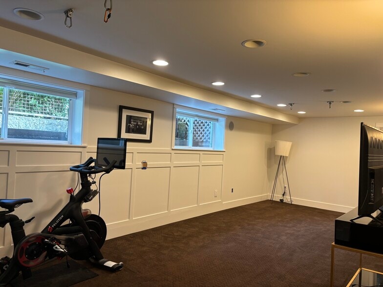 Lower level fully finished rec room, guest suite, pantry and storage - 211 W Boston St