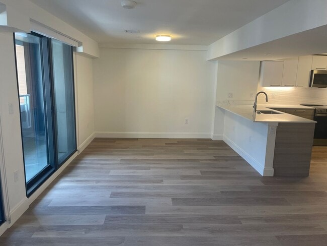 Building Photo - LUXURY 2 BED 2.5 BATH DUPLEX, All New , Laundry in Unit Garage Pool,. NO fee