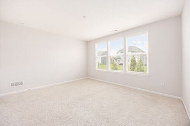 Building Photo - Updated 3-Bedroom Home with 3 Baths, Open-Concept Layout, Luxury Flooring & Bright Modern Kitchen