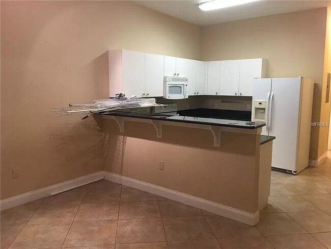 Kitchen area - 5811 La Costa Dr