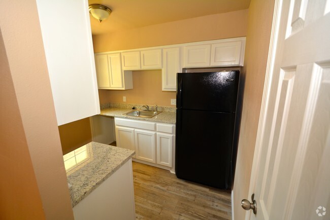 Building Photo - Harmony Apartments-Utilities Included
