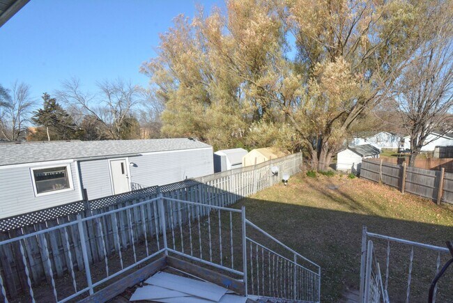 Building Photo - Spacious 5 Bed House with Custom Features Available For Rent!