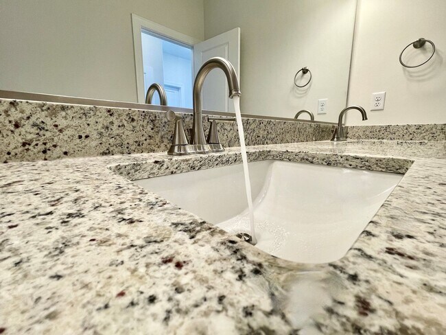 Building Photo - Available 08-05-25! Coastal Luxury Townhom...