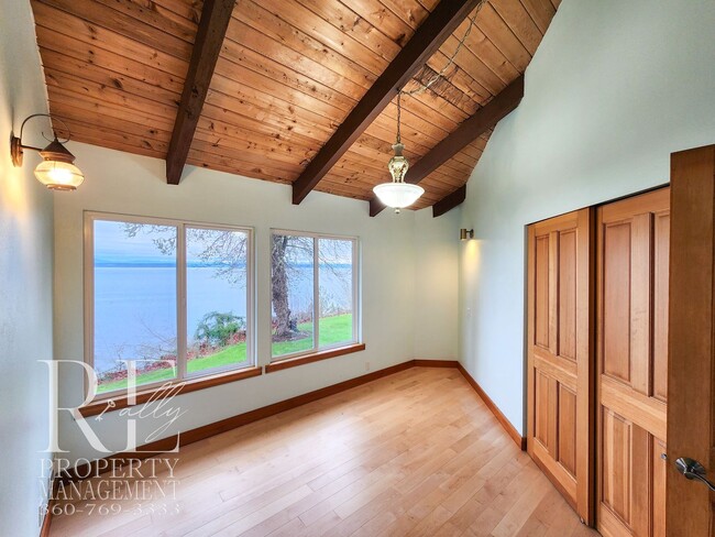 Building Photo - MOVE-IN SPECIAL: 50% OFF FIRST MONTHS RENT - Waterfront Rustic Retreat with Vaulted Ceilings, Pic...
