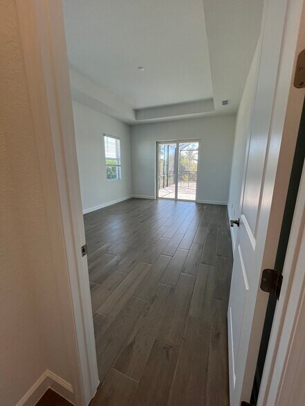 Main bedroom from great room - 8006 Lakes Edge Ln