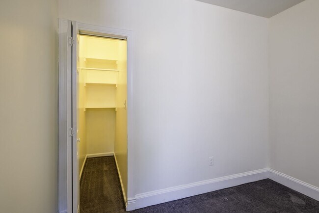 Building Photo - Historic & Charming 3BR Rowhouse near Howard is Move-in Ready!