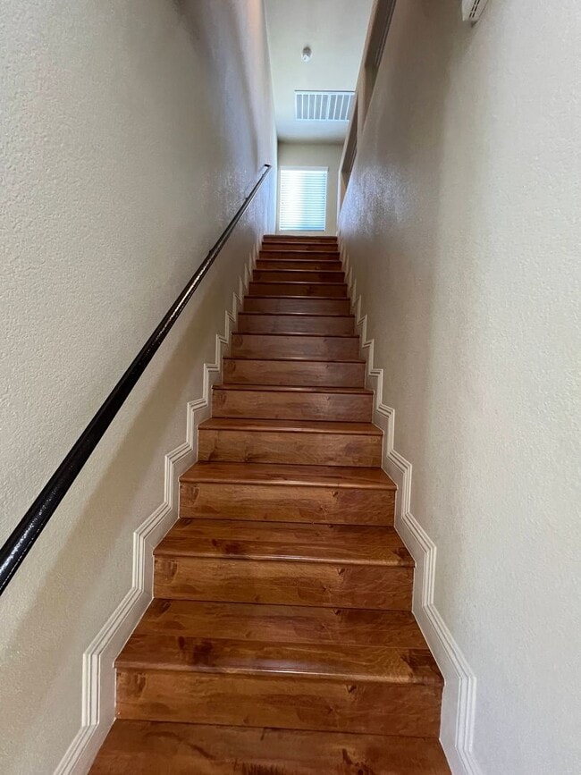 Building Photo - A Fantastic 4 Bedroom Home with the primary Downstairs, in Silverado Ranch