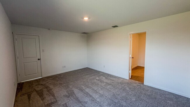 Building Photo - Just Built | Spacious Layout | Private Backyard Retreat