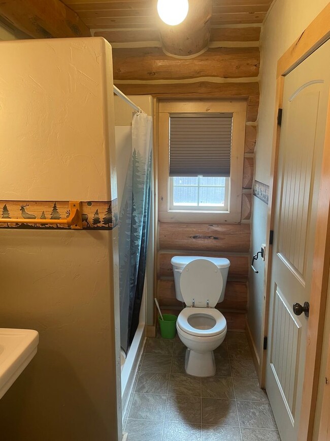 Building Photo - Charming Log Home For Rent with Large Shop & Spacious Yard