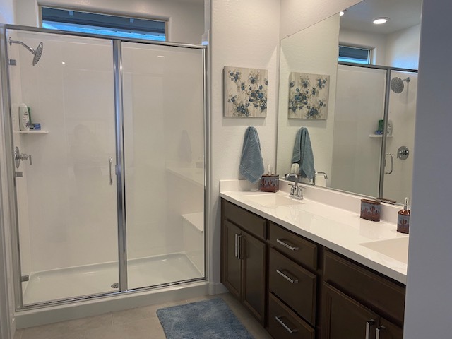 Primary Bath double vanity and shower - 8916 W Solano Dr