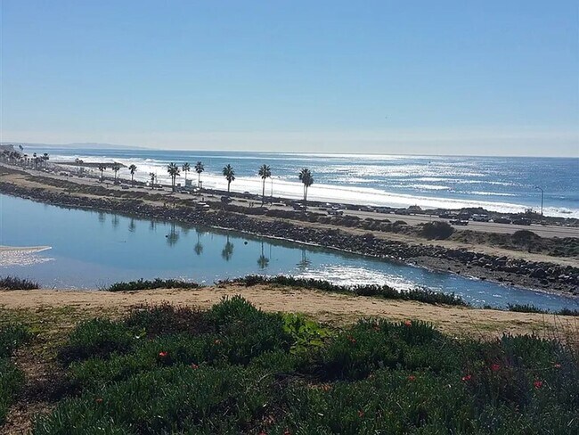 Building Photo - Enjoy unforgettable sunsets, fresh ocean air, and coastal living at its absolute best.