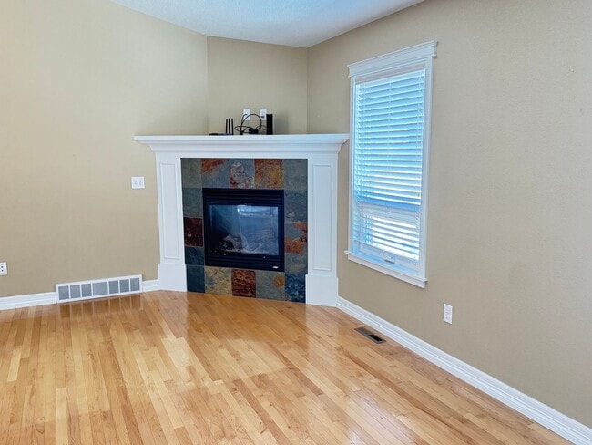 Building Photo - 4 BEDROOM, 3 BATHROOM TWINHOME WITH 2 CAR ATTACHED GARAGE IN NORTH CHEYENNE