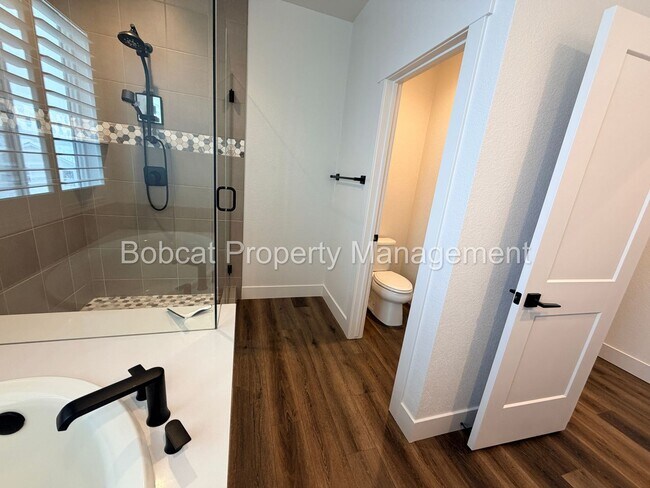 Building Photo - Modern Lock-and-Leave Living in the Heart of Carson City