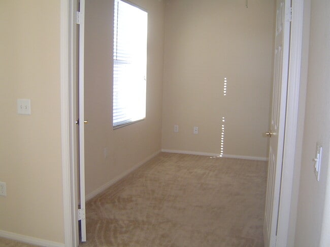 Building Photo - Move-In Ready Condo with Private Balcony & Modern Upgrades