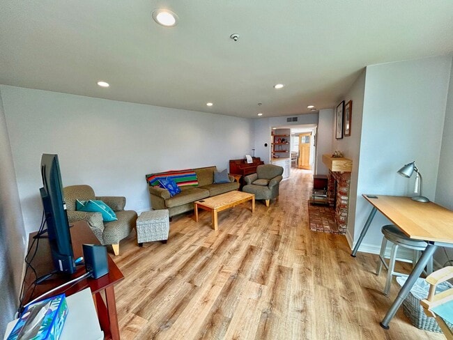 Building Photo - Steps to the beach from this Ocean View Condo with 2 car garage