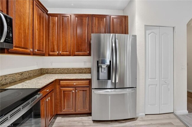 Building Photo - 7054 Ambrosia Ln