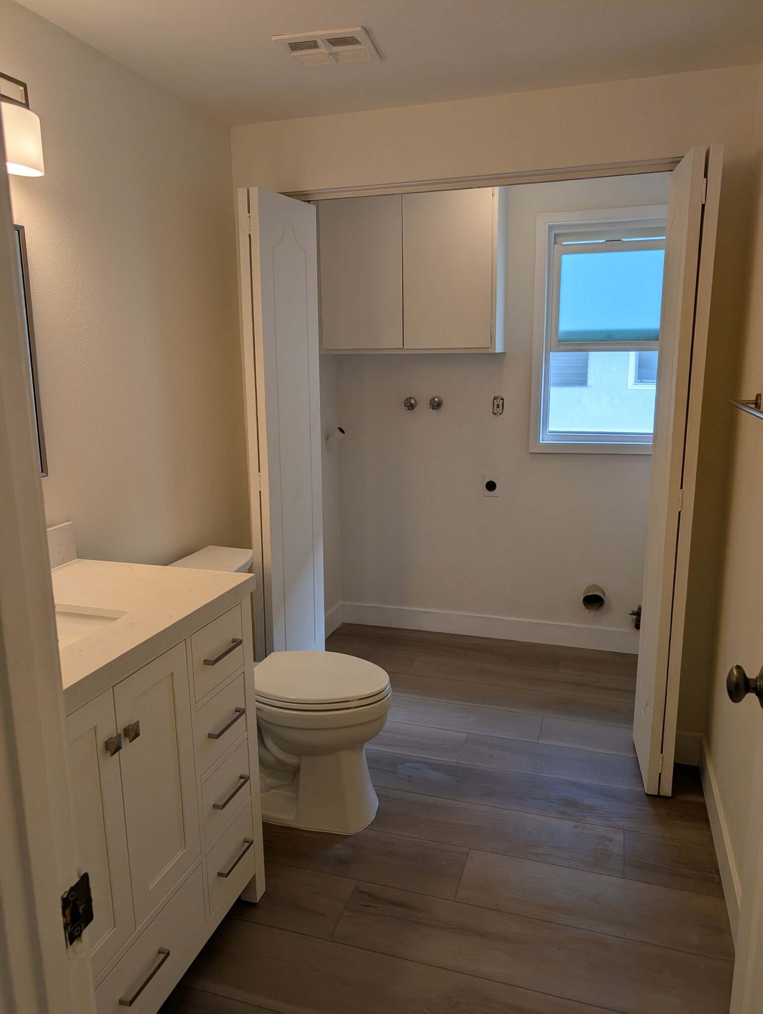 First floor half bath with laundry hook up - 4775 La Villa Marina
