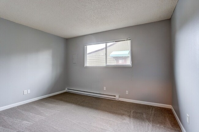 Building Photo - NOW LEASING : Spacious 2BR Upper Unit
