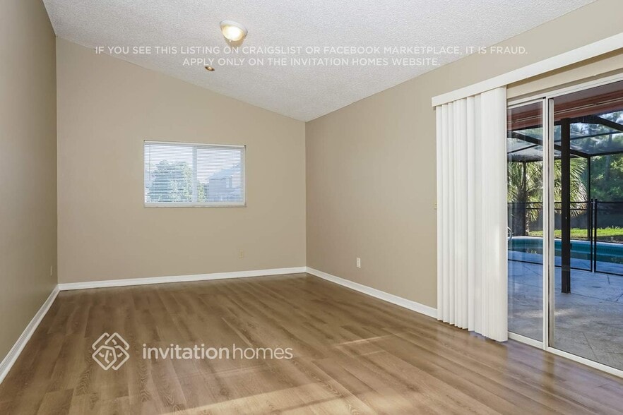 Building Photo - 7115 Queen Palm Cir