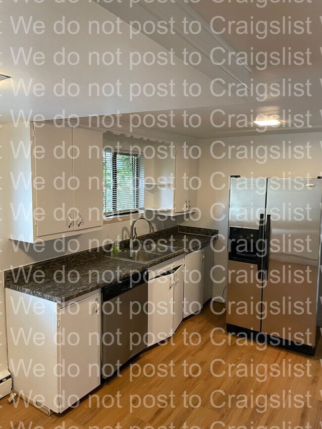 Building Photo - Olympic Hills 4bedroom / 1.5 bath home wit...