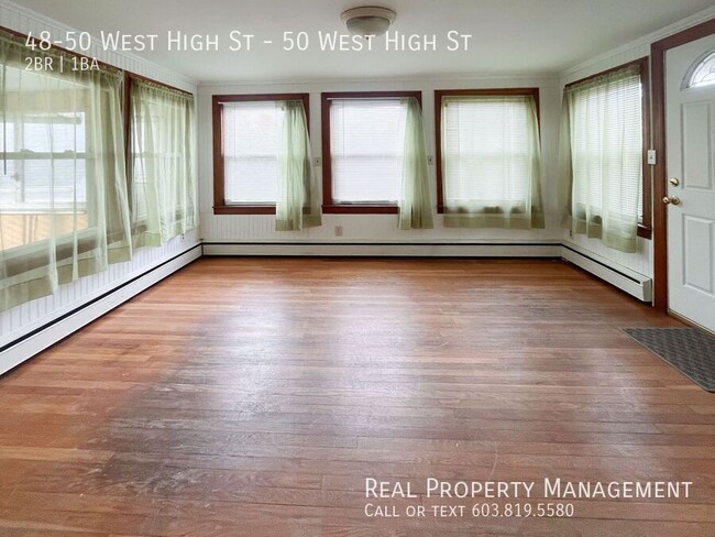 Building Photo - Pet-Friendly 2BD Apartment with Sunroom an...