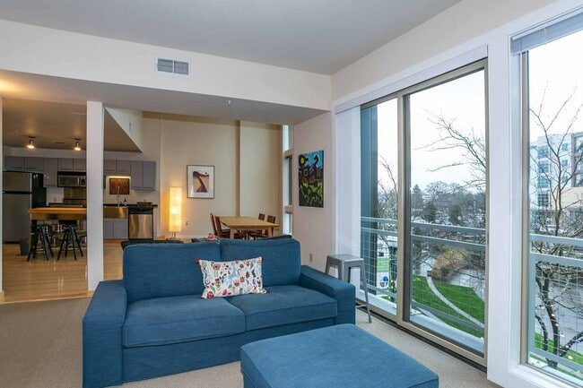 Building Photo - Gorgeous loft-style 2 floor condo with secured parking, A/C and rent includes most utilities!