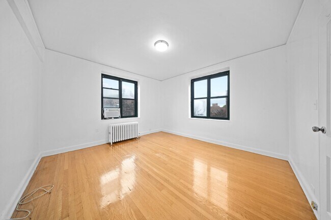 Building Photo - 34-40-40 79th St