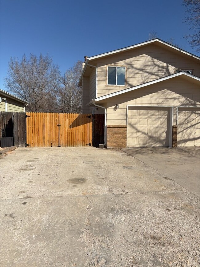 Building Photo - 3 Bedroom - 2 Bath with 2 Car Garage