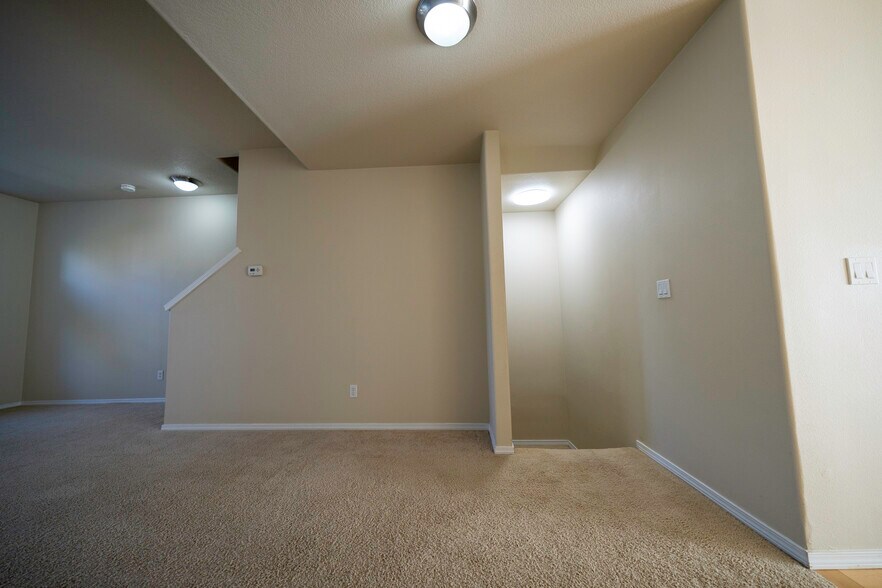 Top of stairs, main floor. - 4828 SE Teakwood St
