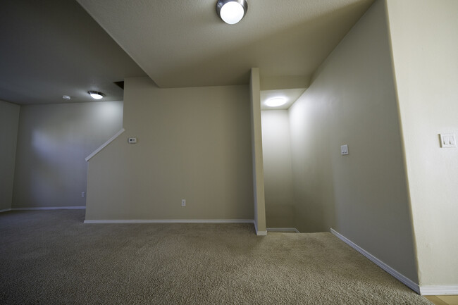Top of stairs, main floor. - 4828 SE Teakwood St