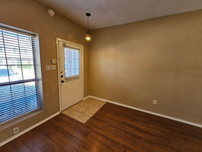 Building Photo - Stunning two-level, two-bedroom, one-and-a-half-bathroom townhome