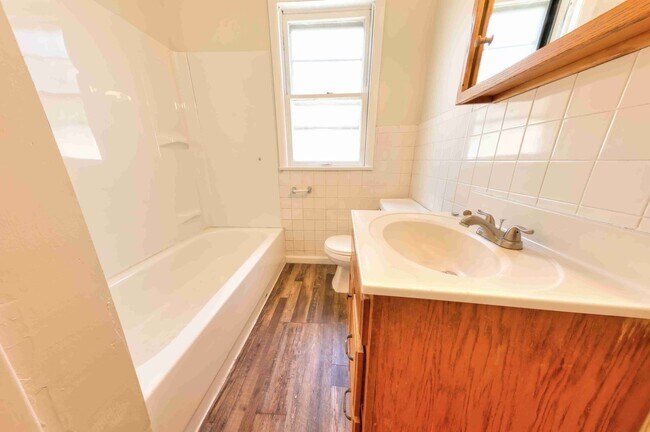 Building Photo - Available Aug 7th - Very nice single family home with refinished hardwood and a very large open l...