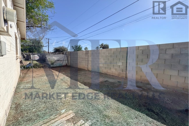 Building Photo - 2Bed/1Bath House at AZ-51/Thomas Rd! -- NO HOA! FENCED-IN YARD! -- NO APPLICATION FEE!