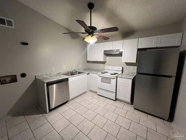 Building Photo - 6809 Tiki Ln