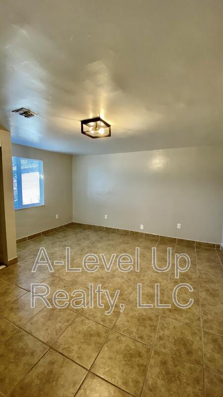 Building Photo - 3909 S 14th Ave