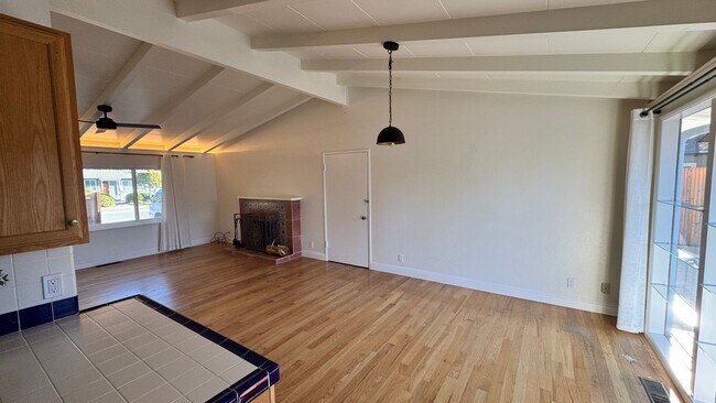 Building Photo - Mission Fields Home, 3 bedroom 2 bath, Fire Place, large fenced yard, 2 car garage fully finished...