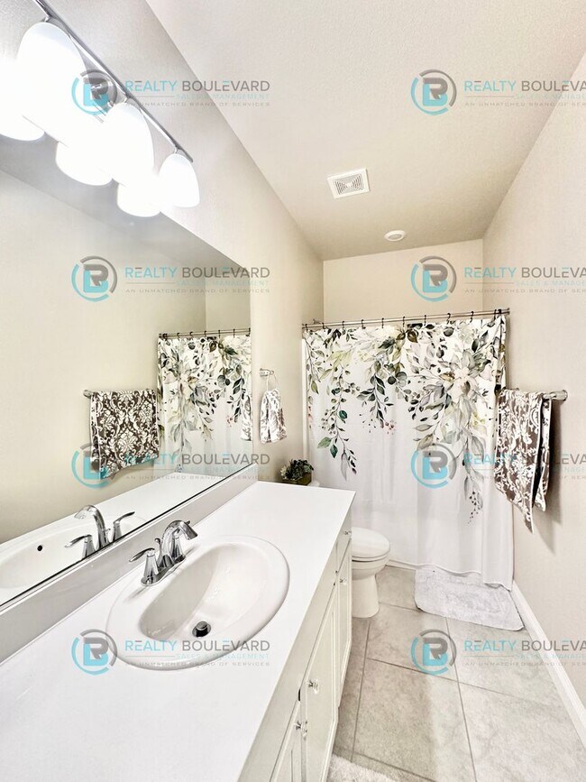 Building Photo - Welcome to your dream home, where modern elegance meets unparalleled convenience!