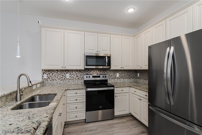 Building Photo - 9072 Covina Dr N